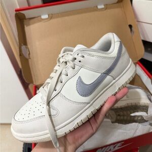 Nike Low-Top Sneaker in Cream with Gray Swoosh